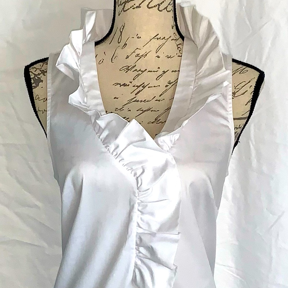 And Taylor sleeveless white blouse size 10